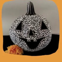 Hand painted Halloween Pumpkin made of clay pink, orange and white colors